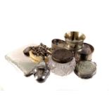 An assortment of silver and silver plated items, including napkin rings, flatware, a vesta case, a