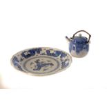 A pair of Chinese blue and white ceramic plates, together with a blue and white teapot, plus a
