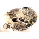 A small selection of costume jewellery, to include a mosaic brooch, a silver and peacock feather