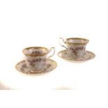 An assortment of Royal Albert 'Dimity Rose' pattern service items, including cups and saucers, small