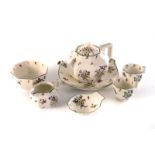 A Royal Doulton 'Old Leeds Sprays' twelve setting tea service, together with a shell spoon dish of