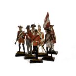 A collection of ten E.V. Howell painted military officers and soldiers, comprising flat wooden