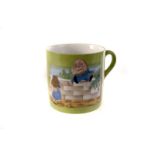 An Edward VII Humpty Dumpty cup, the pale green ground with printed image of Humpty Dumpty on the