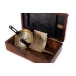 A brass naval compass, having brass fittings, in wooden case