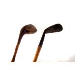 A group of eight hickory shaft golf clubs, including drivers, wedges and putter (8)