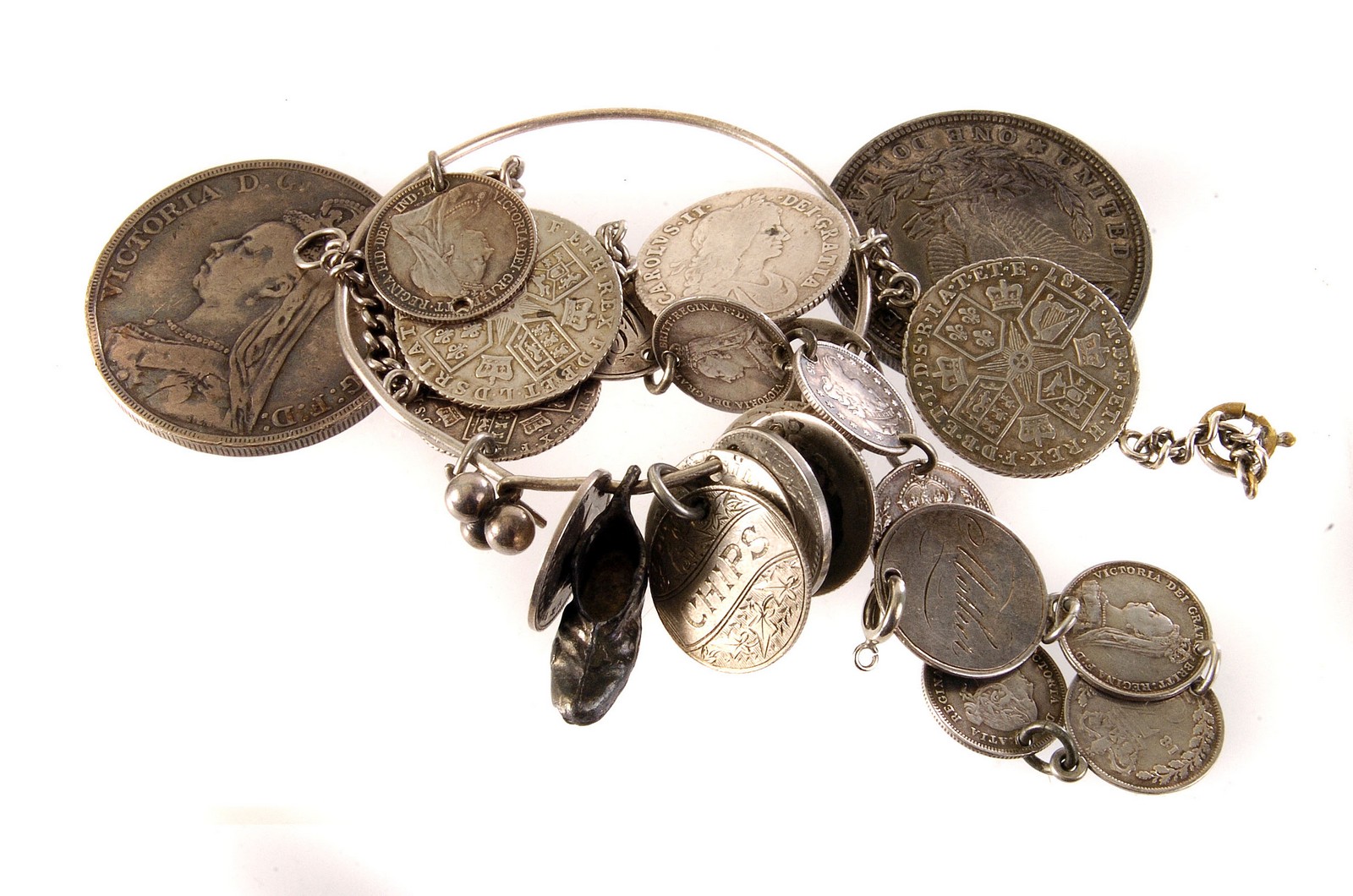 A collection of British and American coins, some mounted in jewellery, comprising a Charles II and