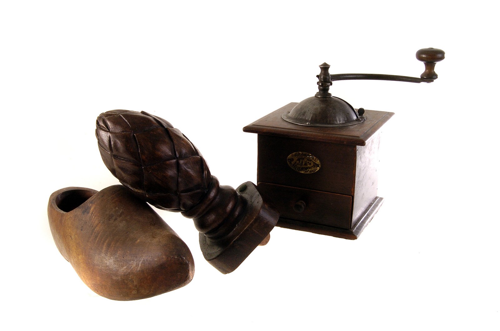 A collection of wooden items, to include a washing dolly, a coffee grinder, a finial, a carved
