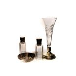 A silver based lead crystal trumpet vase, together with a pair of silver topped French vanity bottle