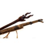 A African carved tribal witch doctor's cane, having carved animal head to top, together with an