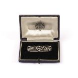 A pretty Belle Époque Edwardian diamond set brooch, the rectangular pierced mount set with brilliant