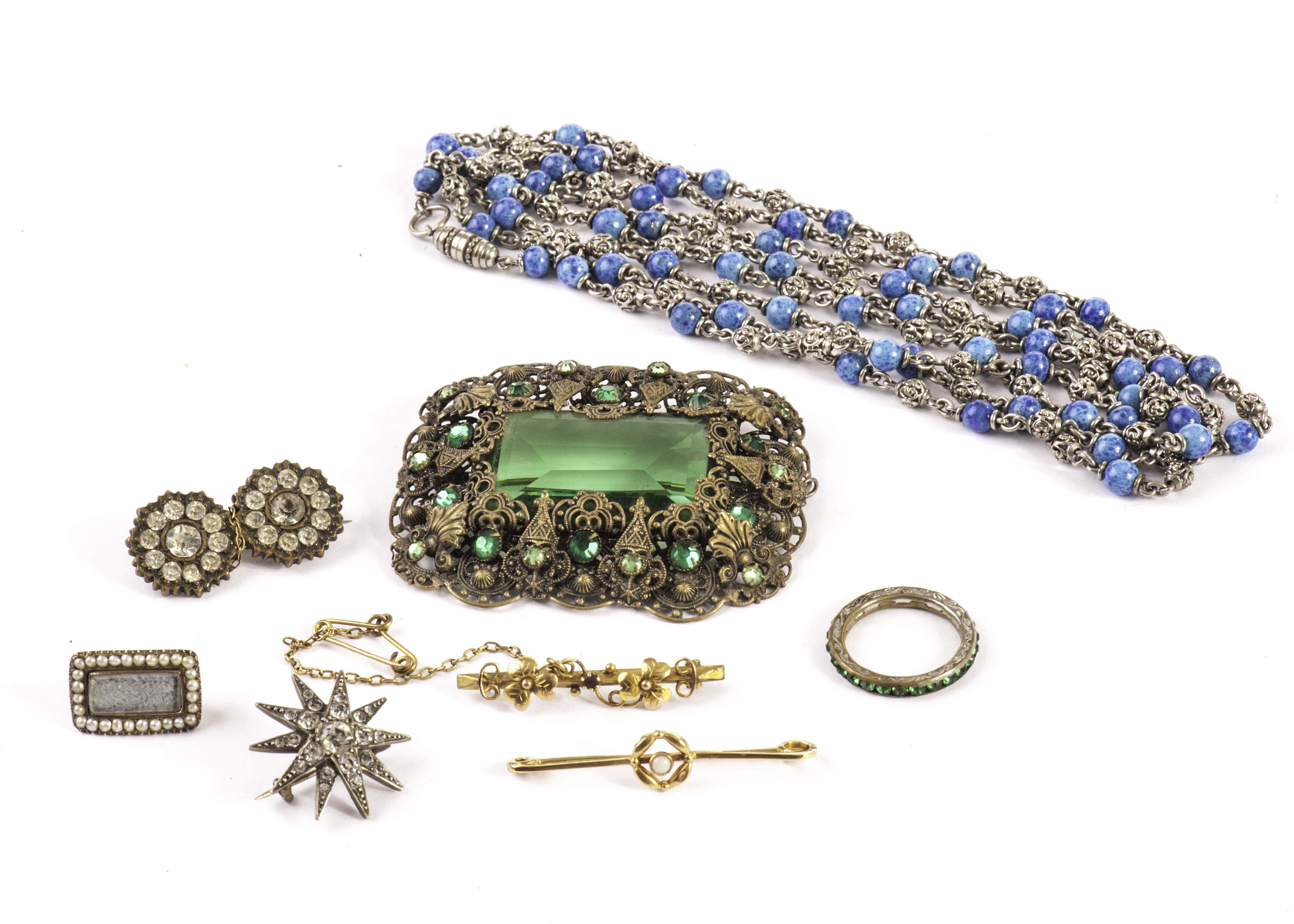 A group of eight pieces of jewellery, including a large Art Deco paste set brooch, two gold bar