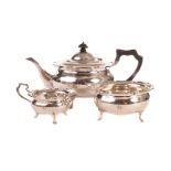 A George V three piece silver tea set, by Wilson & Sharp, London 1910 27ozt Impact damage to one leg