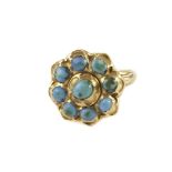 An antique gold and turquoise dress ring, the large cluster style tablet set with turquoise beads