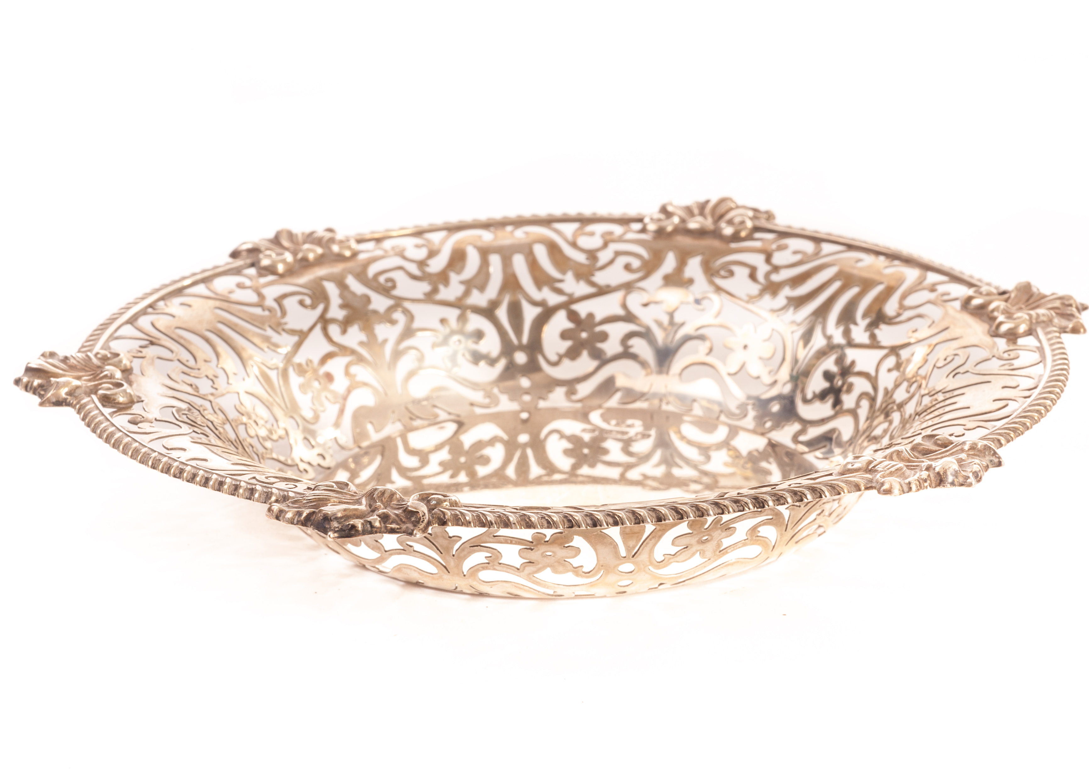 An Edward VII silver dish by W.A, the circular dish with pierced scrolling foliate designs having - Image 2 of 2