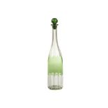 A Bohemian glass decanter, the elegant form bottle with cut flash green body, having a green stopper