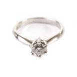 A modern diamond solitaire engagement ring, the 0.57ct brilliant cut in six claw 18ct gold mount