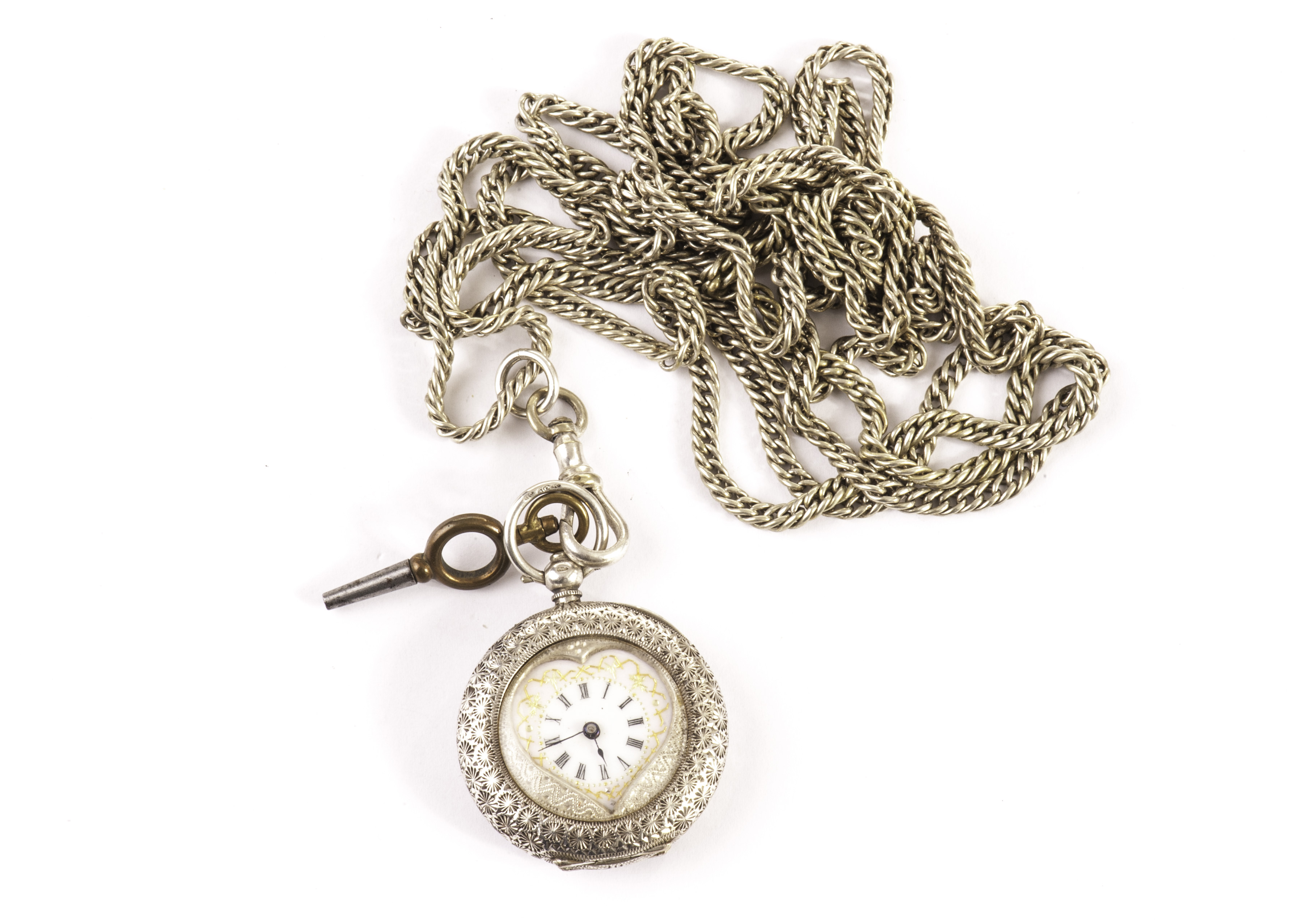 A pretty continental silver ladies fob watch, with heart shaped cut cover and enamelled dial,