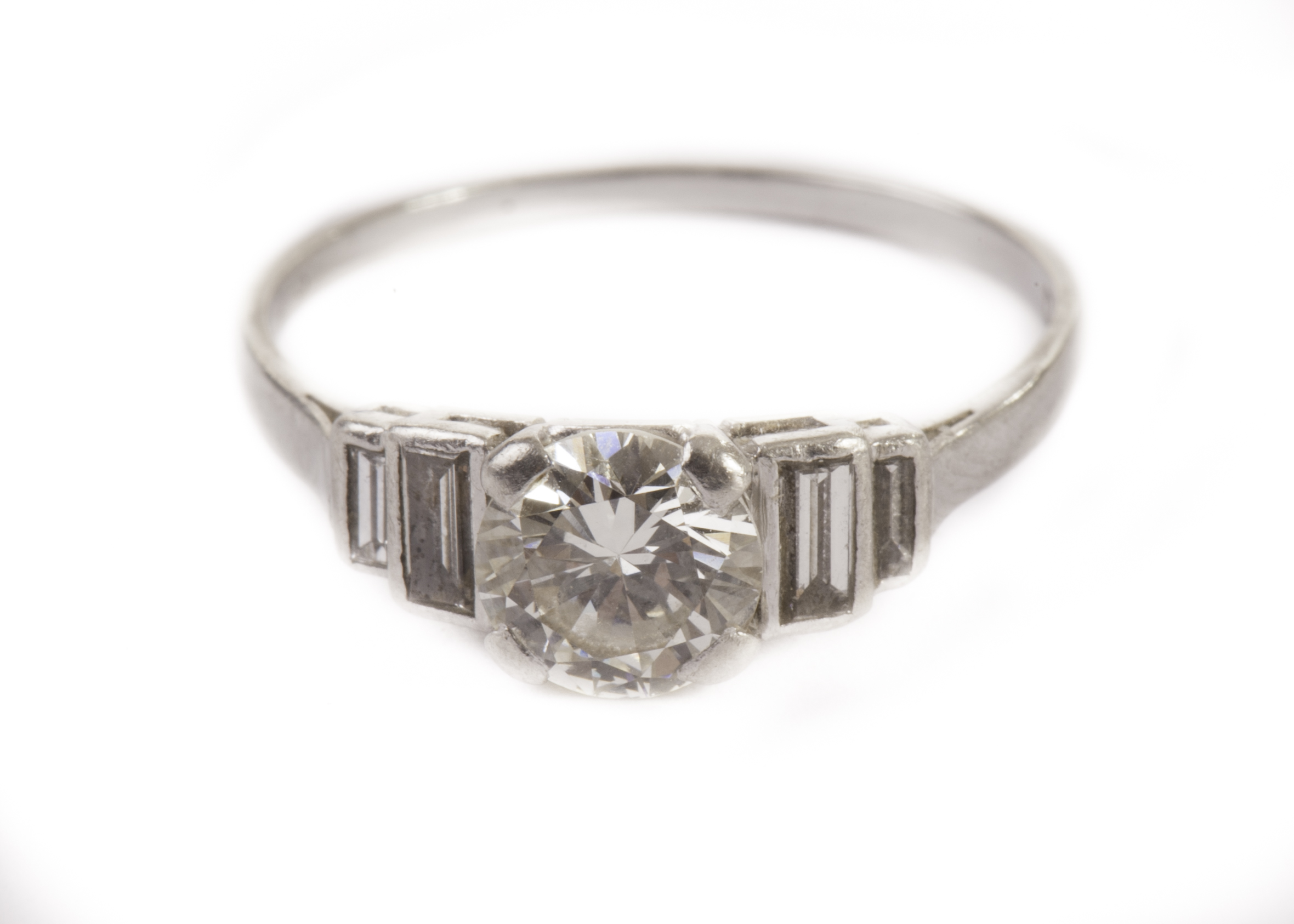A pretty Art Deco period diamond engagement ring, with a good quality approx 1ct brilliant cut in