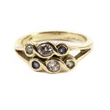 A sapphire and diamond modern dress ring, having a double tablet of three stones, unmarked