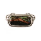 A vintage silver and enamel Fleetwood Varley style brooch, with an oblong landscape scene in mount