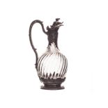 A late 19th century French silver mounted claret jug, retailers stamp for L. Lapar, St. de Beguin,