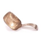 A George III silver tea caddy spoon J.W, with bright cut designs, bearing strike marks for