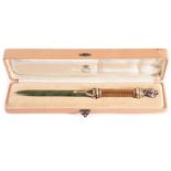 A Russian silver gilt and hardstone letter opener knife, the Faberge style dagger in fitted case,