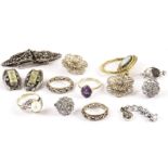 Two silver and marcasite eternity rings, plus other costume jewellery (parcel)