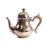 A George VI silver tea pot, by the Goldsmiths & Silversmiths Co. Ltd., London 1945 22ozt Some