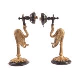 A pair of Regency style ormolu wall light fittings, having circular wall mount having column with