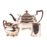 A George V silver teapot and milk jug by Henry Adams, dated Sheffield 1914 & 1912, together with a