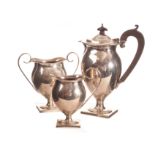 A George V silver filled three piece coffee set from F&S, the elegant ovoid form bodies on