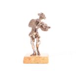 A loaded silver figure of an Israeli fiddle player, marked 925, and presented on yellow marble