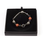 A modern silver and bead charm bracelet by Thomas Sabo, the box link chain with spherical clasp,