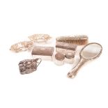 A group of silver items, to include four Victorian silver topped glass dressing table items, an