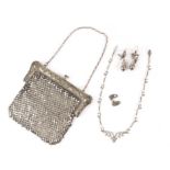 A German silver evening bag, with rococo themed mounts marked 800 supporting a mesh purse,