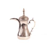 A middle eastern silver water jug, with nickel silver finial, and bone clad handle 21.5ozt total