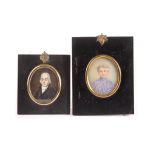 An early 20th century portrait watercolour miniature on ivory, of a distinguished lady initialled EW