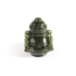 A fine miniature Chinese hardstone pot and cover, the jade style carved vessel with raised band of