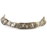 A continental white metal Bandeau, the semi-circular colour, once gilt, having grape and leaf design