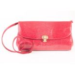 A vintage Gucci style shoulder bag, in red lizard skin, and with diamante clasp, and with