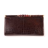 A vintage Gucci style clutch bag, finished in rich bull’s blood alligator skin c.1975 26.5cm W