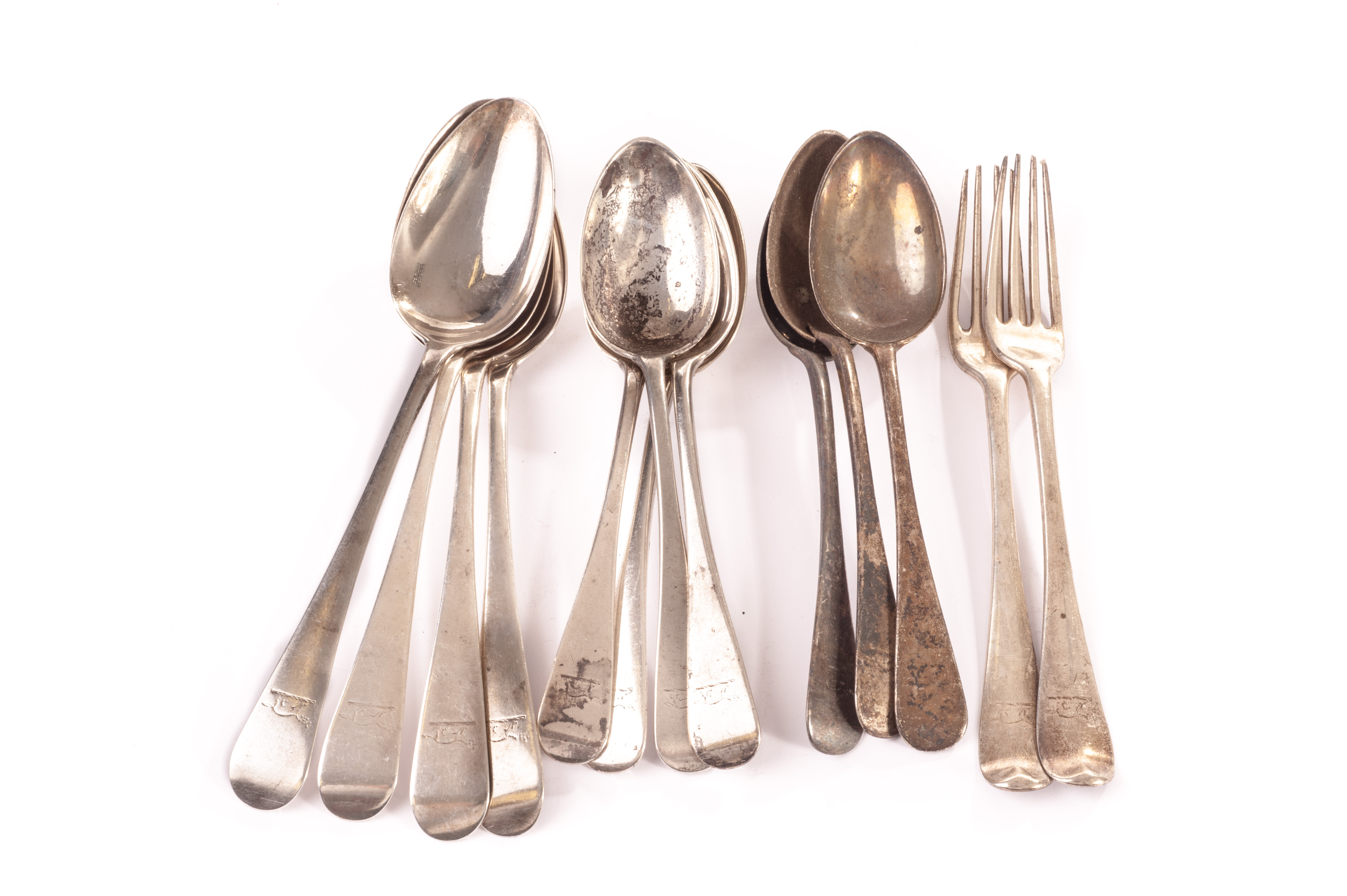 A set of seven Victorian dessert spoons, together with four George III silver table spoons and a