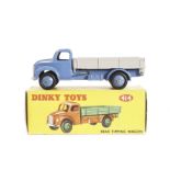 A Dinky Toys 414 Dodge Rear Tipping Wagon, mid-blue cab and hubs, grey back, in original correct