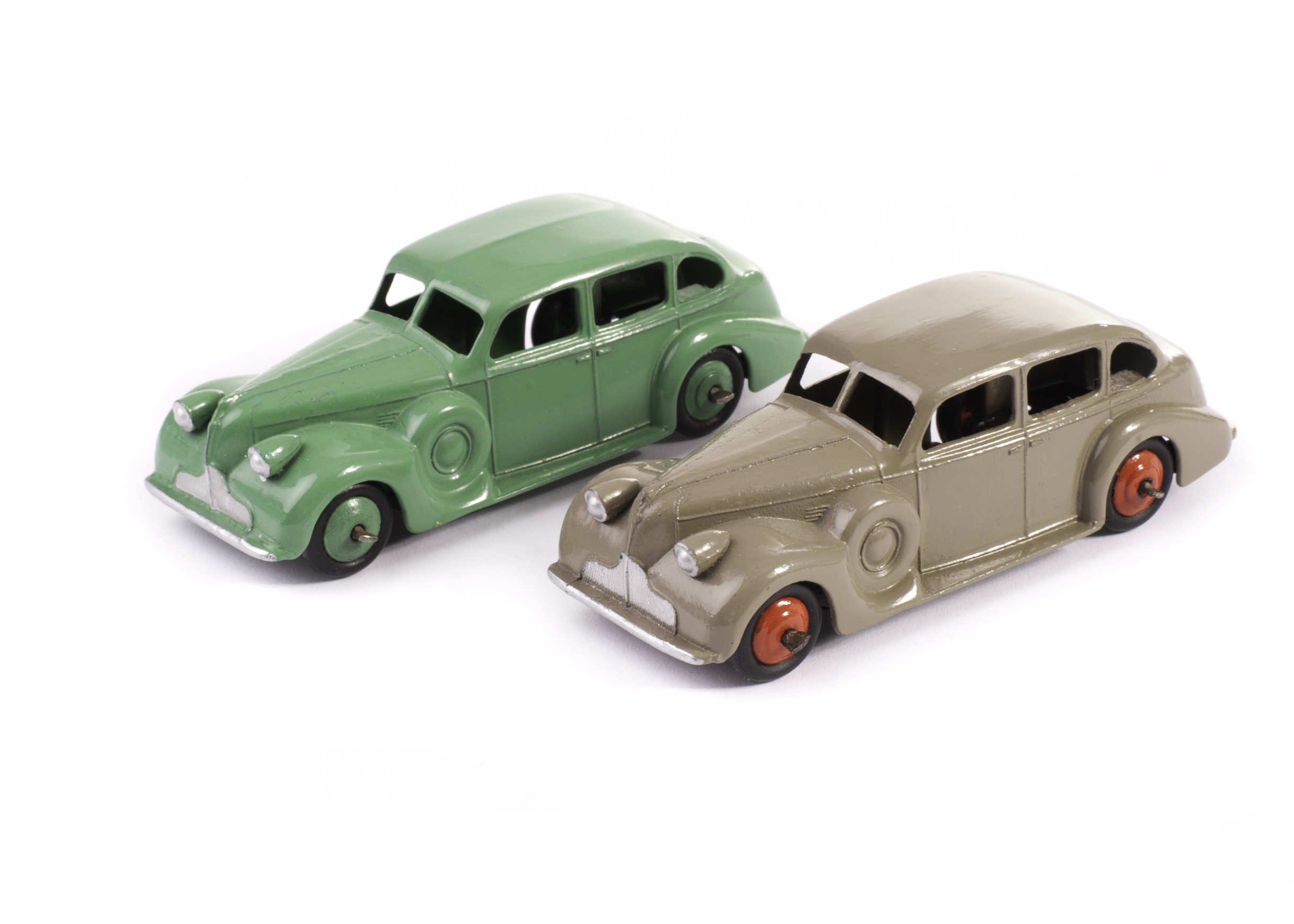 Dinky Toys 39d Buick Viceroy, two examples, first green body and ridged hubs, VG, boot repainted,