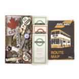 A collection of (mostly) bus-related badges buttons timetables and related items: including ‘CC’