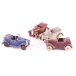 Pre-War Dinky Toys 35d Austin 7 Open Tourer, four examples, brown body (2), grey body, white