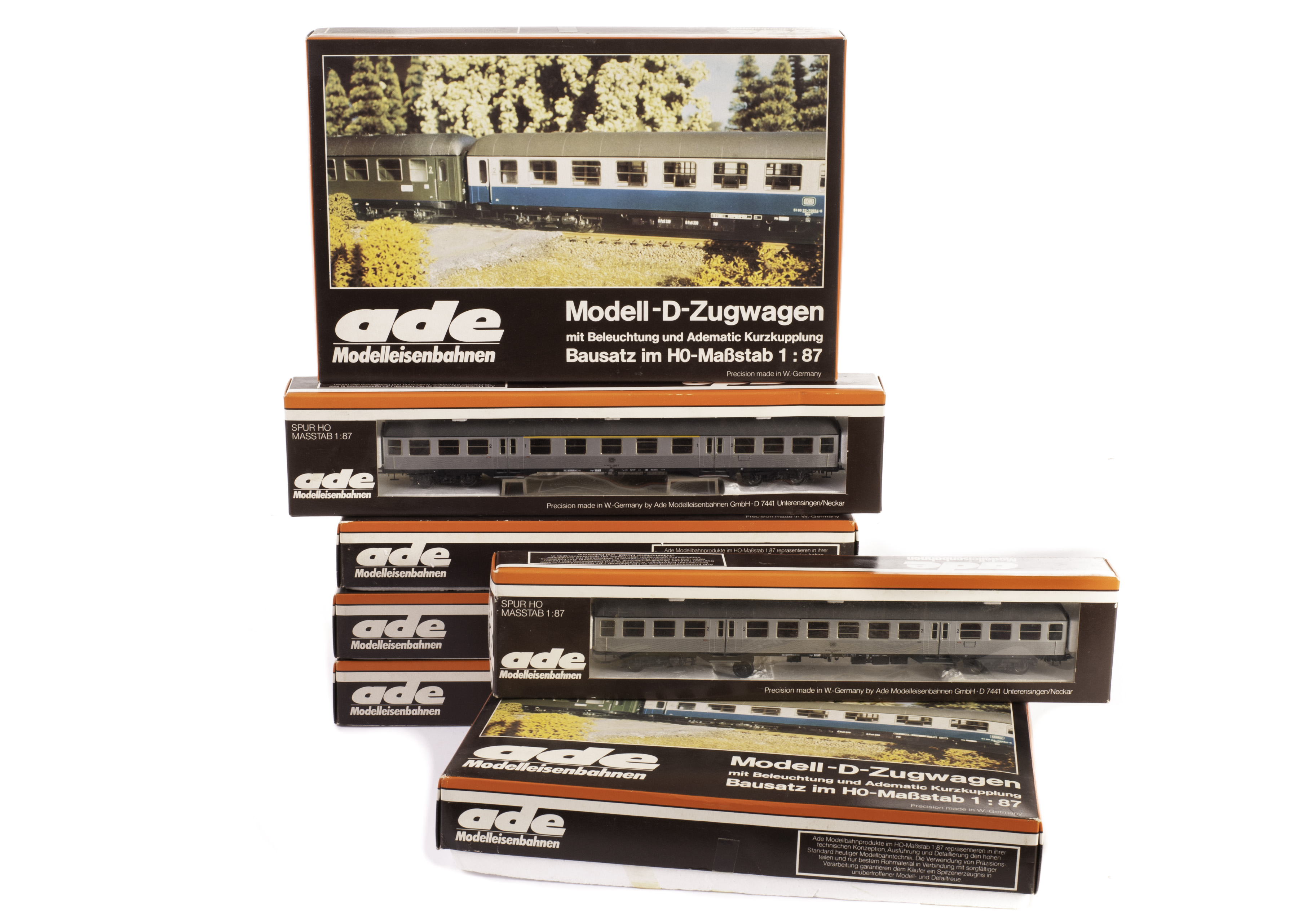 H0 Gauge Coaching Stock by ADE: seven DB coaches, four in green and three in ‘silverfish’ livery (