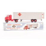 A Dinky Supertoys 948 McLean Tractor-Trailer, red cab, light grey trailer, red plastic hubs, in