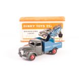 A Dinky Toys 25x Breakdown Lorry, dark grey cab, blue back, red hubs, ‘Dinky Service’ in white, in